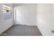 Carpeted bedroom featuring a window and sliding door closet at 42099 W Balsa Dr, Maricopa, AZ 85138
