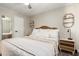 Comfortable bedroom offering a ceiling fan, neutral walls, and charming decorations at 4410 S Grandview Ave, Tempe, AZ 85282