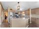 Updated kitchen featuring stainless steel appliances, granite countertops, and ample cabinet space at 5735 E Mcdowell Rd # 388, Mesa, AZ 85215
