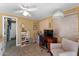Functional office space featuring a ceiling fan, desk, chair, and workspace at 5735 E Mcdowell Rd # 388, Mesa, AZ 85215