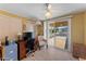 Office space with desk, filing cabinet, chair, and sliding door access to outside at 5735 E Mcdowell Rd # 388, Mesa, AZ 85215