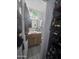 This bathroom has wood look vanity, decorative mirror, and small decor at 6010 W Coolidge St, Phoenix, AZ 85033