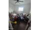 Cluttered bedroom with wood flooring and natural light from the window at 6010 W Coolidge St, Phoenix, AZ 85033