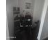 This laundry area is small and contains a box of Home Decor at 6010 W Coolidge St, Phoenix, AZ 85033