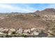 Scenic aerial view of luxury homes nestled on a hillside with desert landscape and mountain views at 6326 W Misty Willow Ln, Glendale, AZ 85310