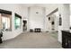 Bright living area features high ceilings, unique tile flooring, and lots of natural light at 6326 W Misty Willow Ln, Glendale, AZ 85310