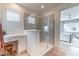 This spacious bathroom has a glass-enclosed shower and a vanity area at 645 N Vine St, Chandler, AZ 85225
