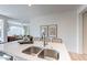 This modern kitchen has a center island, stainless steel appliances, and seating at 645 N Vine St, Chandler, AZ 85225