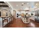 Bright, open kitchen with a large island, stainless steel appliances, and wood floors at 7002 E Aster Dr, Scottsdale, AZ 85254