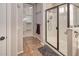 Modern bathroom showcasing a glass-enclosed shower, neutral walls, and tile flooring at 7252 E Nance St, Mesa, AZ 85207