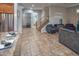 Spacious entryway showcasing tile floors, stairs to the second level, and access to the downstairs bathroom at 7252 E Nance St, Mesa, AZ 85207