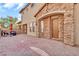 Beautiful front entrance with stone accents, brick flooring, and a warm, inviting ambiance at 7252 E Nance St, Mesa, AZ 85207