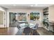 Bright dining area with pool views from windows and sliding glass doors, next to the kitchen at 7326 E Portland St, Scottsdale, AZ 85257