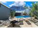 Backyard showcasing a refreshing pool, comfortable lounge chairs, and desert foliage at 7326 E Portland St, Scottsdale, AZ 85257