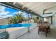 Inviting backyard featuring a sparkling pool, lush desert landscaping, and a covered patio at 7326 E Portland St, Scottsdale, AZ 85257