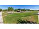 Large community park featuring walking paths, picnic tables, playground and trees at 7528 E Peralta Ave, Mesa, AZ 85212