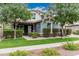Inviting single-Gathering home with lush landscaping and a welcoming front entrance at 7528 E Peralta Ave, Mesa, AZ 85212