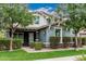 Attractive home with mature trees, well-kept lawn, and welcoming front entrance at 7528 E Peralta Ave, Mesa, AZ 85212