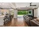 Open-concept living room with stylish seating and a view of the outdoor space at 7528 E Peralta Ave, Mesa, AZ 85212