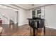Beautiful living room with a piano and adjacent view of the stairs in the foyer at 7528 E Peralta Ave, Mesa, AZ 85212