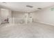 Spacious carpeted loft area with white banister and ample natural light, perfect for entertaining and recreation at 7528 E Peralta Ave, Mesa, AZ 85212