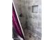 Shower with brown tiling, silver hardware, and shower niche at 8055 E Thomas Rd # H103, Scottsdale, AZ 85251