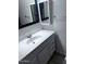 Bathroom with white vanity and white sink at 8055 E Thomas Rd # H103, Scottsdale, AZ 85251
