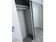 Closet with sliding mirror doors and shelving at 8055 E Thomas Rd # H103, Scottsdale, AZ 85251