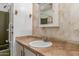 The bathroom includes a sink and a medicine cabinet above at 8302 E Dutchman Dr, Mesa, AZ 85208