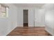 This bedroom features wood floors and closet at 8302 E Dutchman Dr, Mesa, AZ 85208