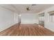 Open-concept living area featuring stylish laminate flooring and neutral decor at 8302 E Dutchman Dr, Mesa, AZ 85208