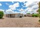 Low maintenance backyard featuring multiple structures and desert landscaping at 8330 E Pueblo Ave, Mesa, AZ 85208
