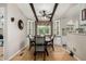 Dining room with built-in cabinets, modern chandelier, and a cozy atmosphere at 8330 E Pueblo Ave, Mesa, AZ 85208