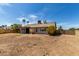Large backyard providing ample space for recreation, gardening, and customization, complimented with a covered patio at 8703 W Golden Ln, Peoria, AZ 85345