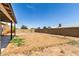 Spacious backyard with block wall and ample space for landscaping at 8703 W Golden Ln, Peoria, AZ 85345