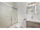 Bathroom featuring shower and tub, new vanity and lighting at 8703 W Golden Ln, Peoria, AZ 85345
