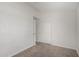 Bedroom featuring carpet, white walls and closet, offering a cozy space at 8703 W Golden Ln, Peoria, AZ 85345