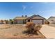 Well-kept single-level home with desert landscaping, easy to care for at 8703 W Golden Ln, Peoria, AZ 85345