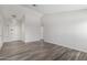 Bright, open living room boasts modern wood flooring and plenty of space at 8703 W Golden Ln, Peoria, AZ 85345