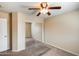 Bedroom with neutral carpet and sliding closet door at 9 N 87Th N Ln, Tolleson, AZ 85353