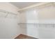 Walk-in closet with wire shelving and carpeted floor at 9 N 87Th N Ln, Tolleson, AZ 85353
