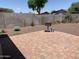 Backyard features desert landscaping, patio, and BBQ grill at 108 E Jasmine St, Mesa, AZ 85201