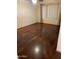 Bedroom features hardwood flooring and window at 108 E Jasmine St, Mesa, AZ 85201