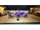 Backyard oasis featuring a sleek pool, comfortable lounge seating, and a beautifully landscaped setting at 1297 W Chillingham W Rd, San Tan Valley, AZ 85143