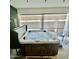 Inviting hot tub under covered patio, perfect for relaxation and outdoor enjoyment at 1297 W Chillingham W Rd, San Tan Valley, AZ 85143