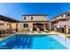 Backyard pool with patio, pergola, and chaise lounges, with a view of the exterior at 1297 W Chillingham W Rd, San Tan Valley, AZ 85143
