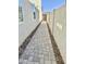 Paver walkway in side yard leading to gate at 1297 W Chillingham W Rd, San Tan Valley, AZ 85143