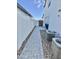 Paver walkway in side yard leading to gate at 1297 W Chillingham W Rd, San Tan Valley, AZ 85143