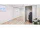 Bright bedroom features mirrored closet doors, natural light, and vinyl floors at 13013 N 18Th St, Phoenix, AZ 85022