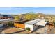 Aerial view of the home with desert landscaping, perimeter fencing, and nearby mountain views at 13013 N 18Th St, Phoenix, AZ 85022